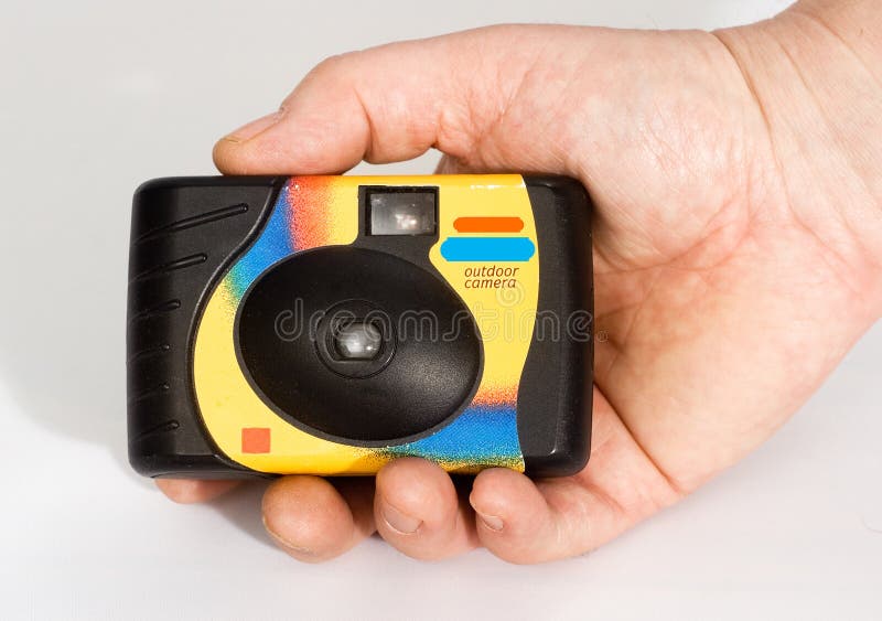 A disposable camera in hand, photographer