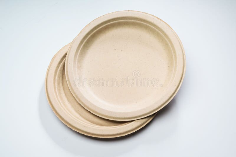 Disposable Plates Made of Vegetable Raw Materials Lie on the Table