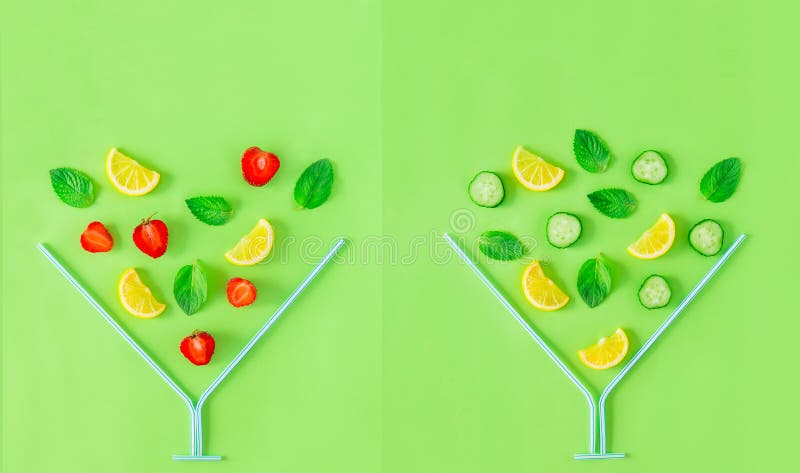 Disposizione creativa Ingredienti della limonata del cetriolo e della fragola, limone, menta che cade in vetro del coctail fatto fotografie stock Disposizione creativa Ingredienti della limonata del cetriolo e della fragola, limone, menta che cade in vetro del coctail fatto fotografie stock