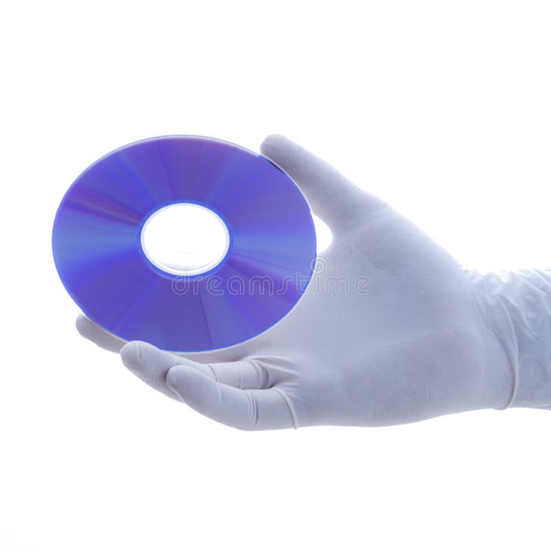 Disque enfilé de gants de fixation de main. image libre de droits Disque enfilé de gants de fixation de main. image libre de droits