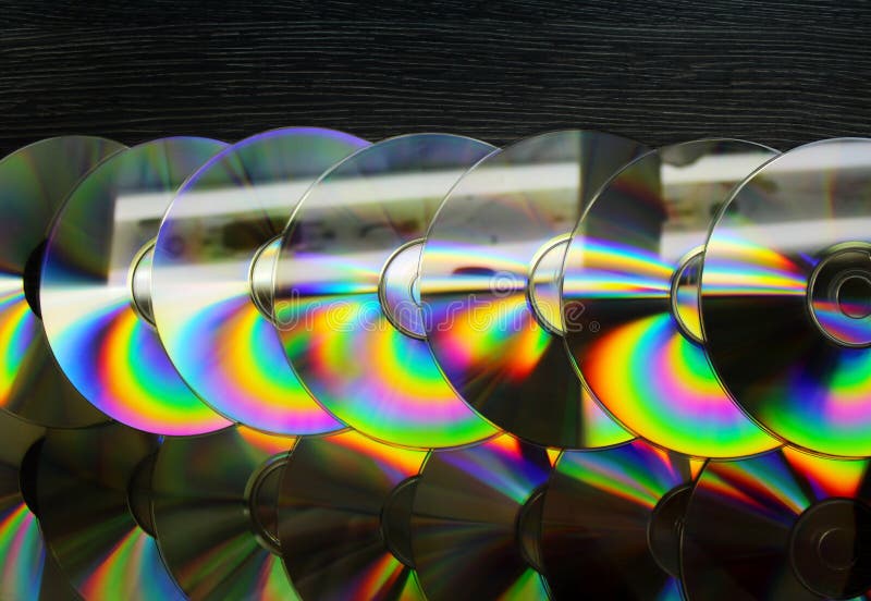 Disques de CD et de DVD comme fond images libres de droits Disques de CD et de DVD comme fond images libres de droits