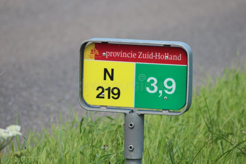 Distance sign 3.9 kilometers at the regional road N219 at Nieuwerkerk aan den IJssel in the Netherlands. royalty free stock photo Distance sign 3.9 kilometers at the regional road N219 at Nieuwerkerk aan den IJssel in the Netherlands. royalty free stock photo