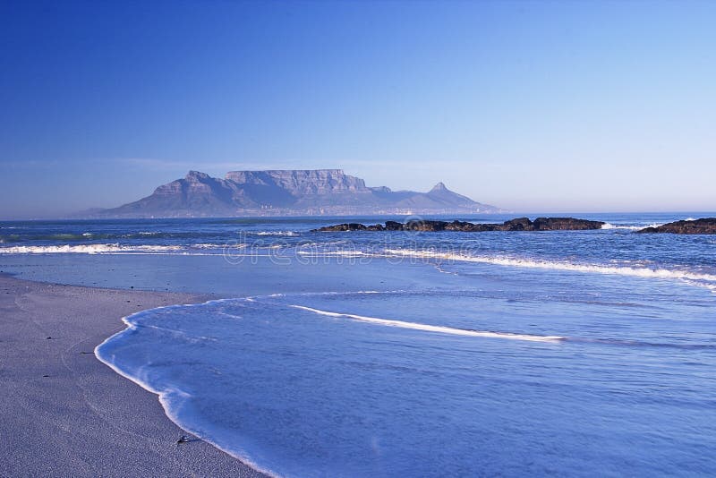 Distant Mountain across the sea royalty free stock photo
