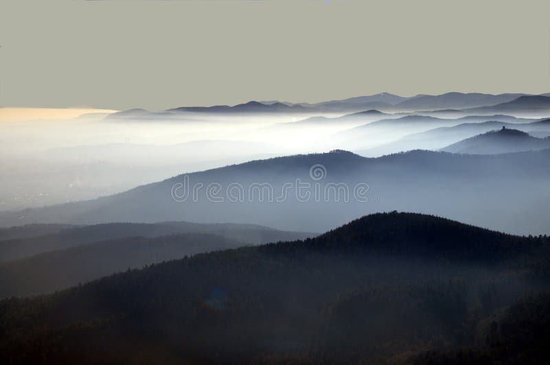 Distant mountain silhouette with clear sky and soft light