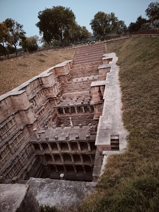Distant view of a picturesque step well in India stock images