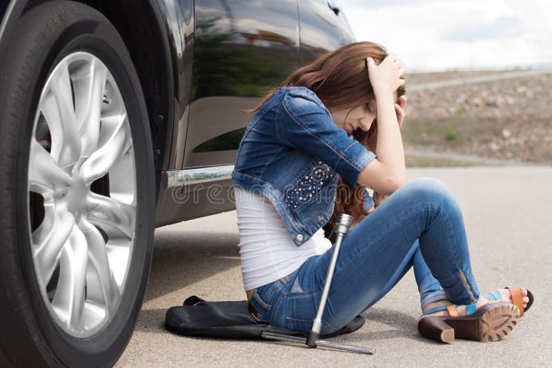 Distraught young woman waiting for assistance