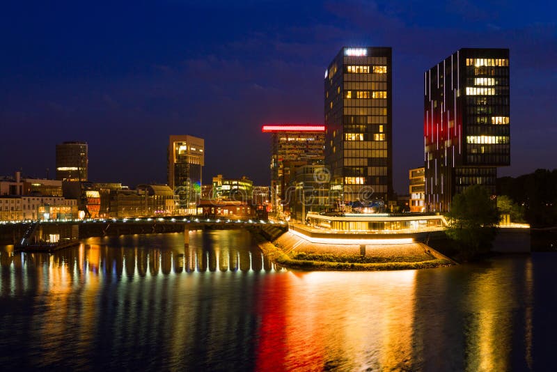 Business district of Düsseldorf and Rhine river at night. Business district of Düsseldorf and Rhine river at night