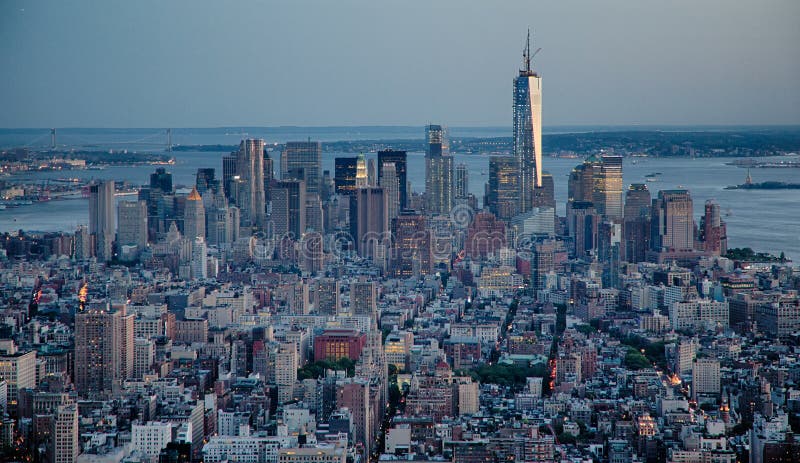 Financial District in NYC from the Empire State Building at sunset. Including the new Freedom Tower and spire. Financial District in NYC from the Empire State Building at sunset. Including the new Freedom Tower and spire.