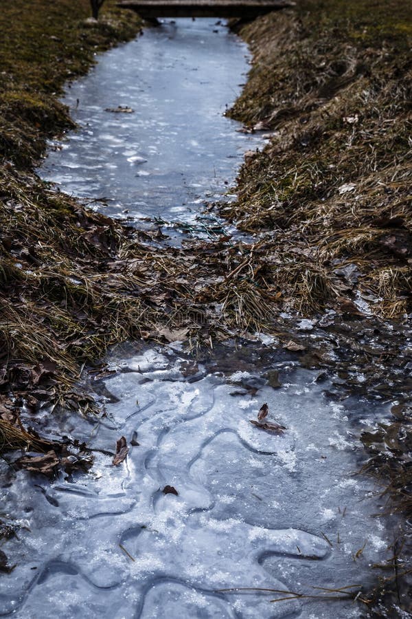 The Ditch is Frozen and the Sky Colors Beautiful Red and Orange when