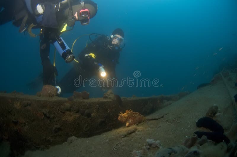 Divers exploring a wreck, Croatia