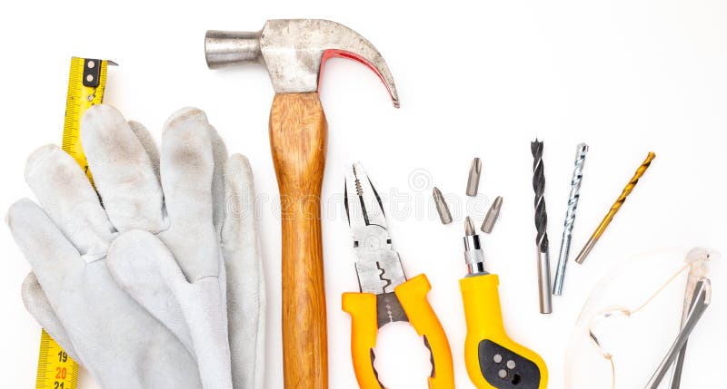 Divers outils de construction D'isolement sur le fond blanc Marteau de DIY, gants et verres de sûreté faits maison, mètre, pinces images libres de droits Divers outils de construction D'isolement sur le fond blanc Marteau de DIY, gants et verres de sûreté faits maison, mètre, pinces images libres de droits
