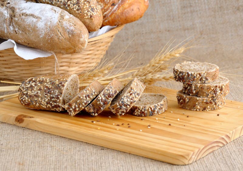 Diverse bread with slices of bread with grains