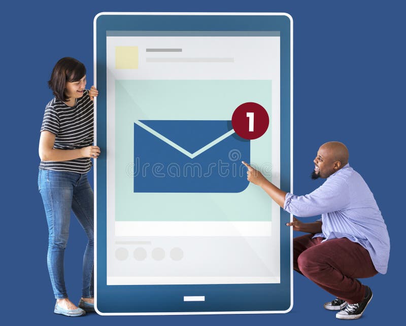 Diverse couple holding a tablet with graphics royalty free stock photography