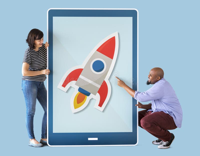 Diverse couple of people holding a tablet royalty free stock image