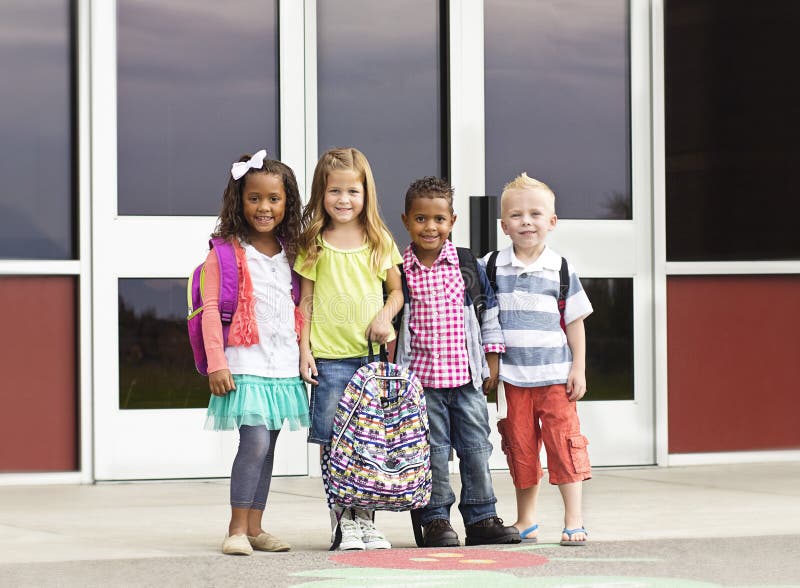 Diverse group of kids going to school royalty free stock photos