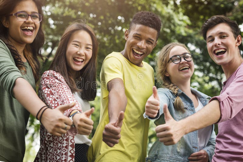 Diverse Group Young People Thumb Up Concept stock photography