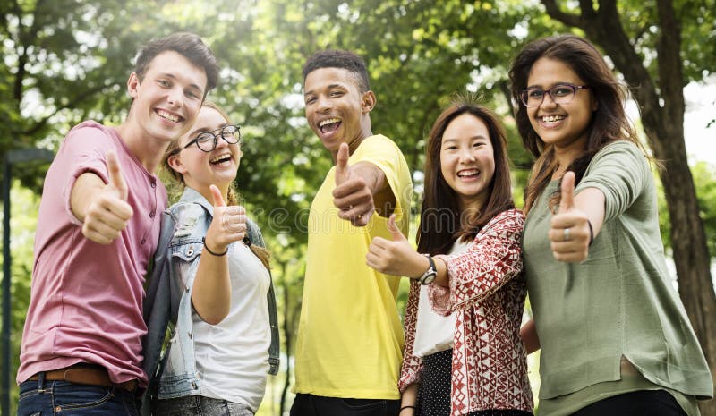 Diverse Group Young People Thumb Up Concept stock photography