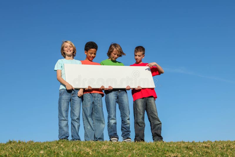Diverse kids holding blank sign royalty free stock image Diverse kids holding blank sign royalty free stock image