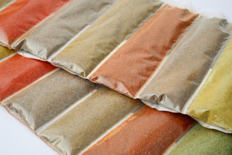 Close up of various ground spices packets. Close up of various ground spices packets