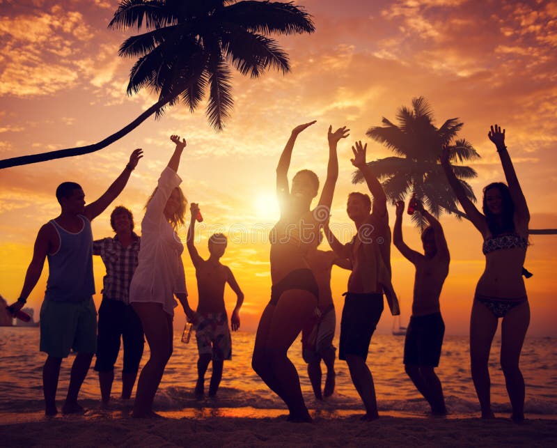 Diverse People Dancing And Partying On A Tropical Beach Stock Image