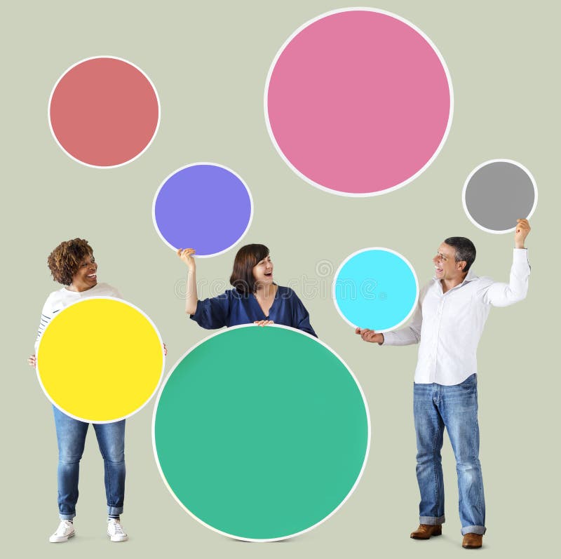 Diverse people holding colorful blank circles stock photos
