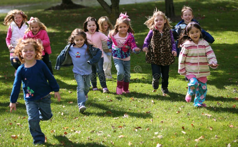 Diverse running kids stock photo