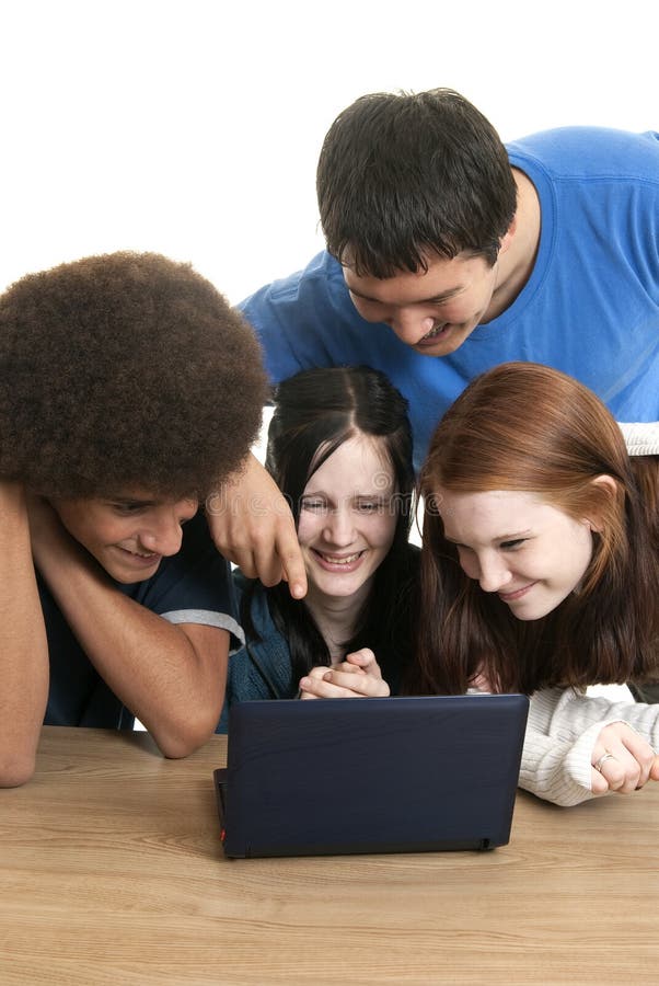 Diverse teens with laptop royalty free stock photo