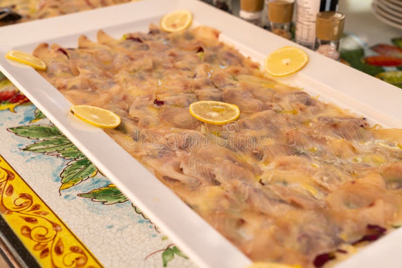 A Diverse Wedding Buffet Featuring Both Meat, Seafood, and Desserts