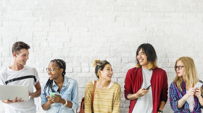 Diversity Friends Using Digital Devices Concept stock images