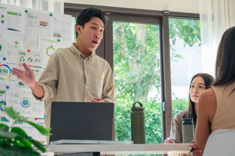 Diversity team presentation in ESG sustainability business goals sdgs in green office stock images