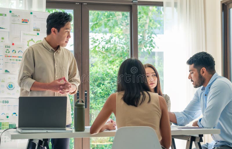 Diversity team presentation in ESG sustainability business goals sdgs in green office royalty free stock image