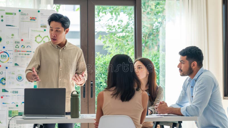 Diversity team presentation in ESG sustainability business goals sdgs in green office stock photography