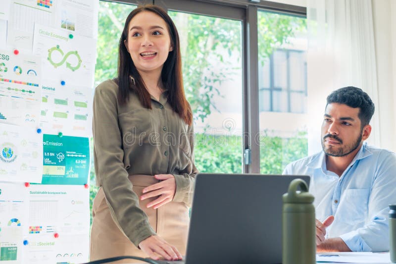 Diversity team presentation in ESG sustainability business goals sdgs in green office stock photo