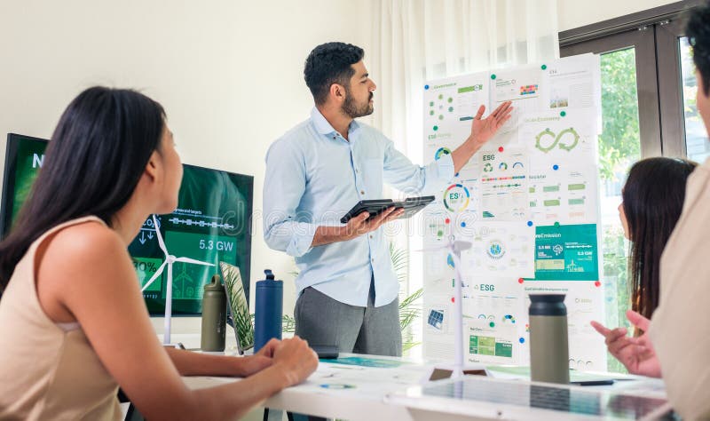 Diversity team presentation in ESG sustainability business goals sdgs in green office stock photos