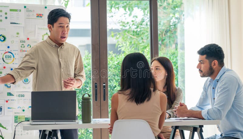 Diversity team presentation in ESG sustainability business goals sdgs in green office stock image