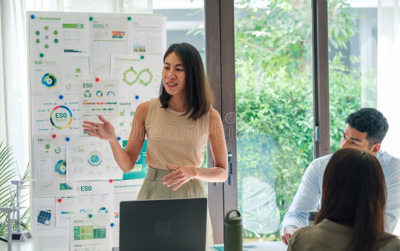 Diversity team presentation in ESG sustainability business goals sdgs in green office stock images