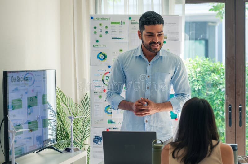 Diversity team presentation in ESG sustainability business goals sdgs in green office stock photography