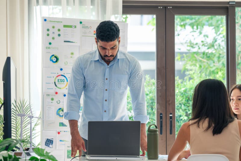 Diversity team presentation in ESG sustainability business goals sdgs in green office stock photos