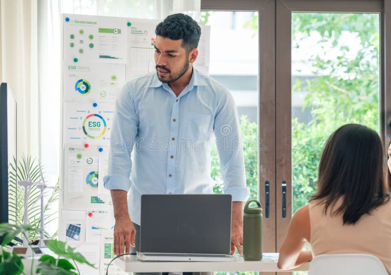 Diversity team presentation in ESG sustainability business goals sdgs in green office royalty free stock photo