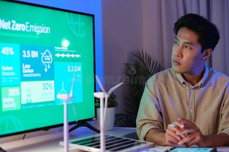 Diversity team presentation about ESG sustainability business goals sdgs in green office at night royalty free stock images