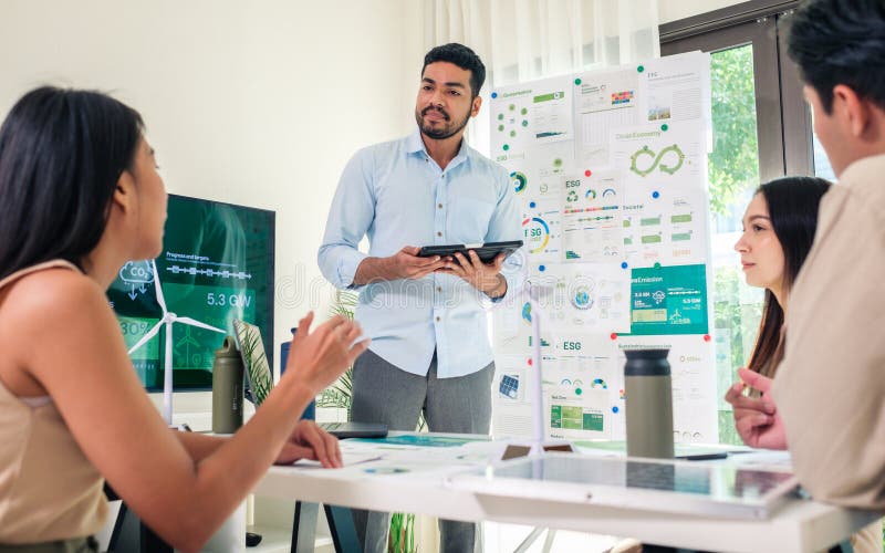 Diversity team presentation in ESG sustainability business goals sdgs in green office royalty free stock photo