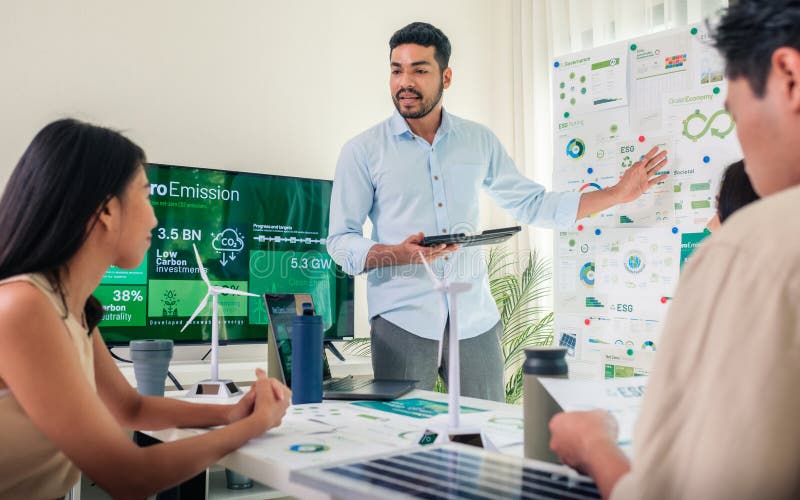Diversity team presentation in ESG sustainability business goals sdgs in green office royalty free stock photo