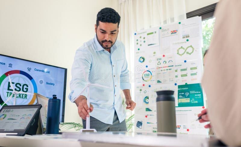Diversity team presentation in ESG sustainability business goals sdgs in green office stock photography