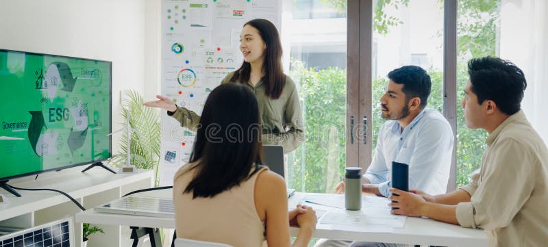 Diversity team presentation in ESG sustainability business goals sdgs in green office royalty free stock photography