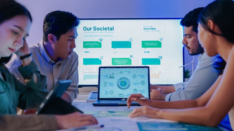 Diversity team presentation about ESG sustainability business goals sdgs in green office royalty free stock images