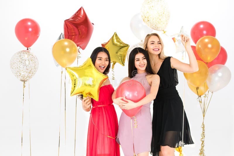 Young women have fun together at party stock image Young women have fun together at party stock image