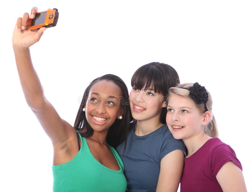 Diversión de tres amigos del adolescente con las cámaras digitales imagenes de archivo Diversión de tres amigos del adolescente con las cámaras digitales imagenes de archivo