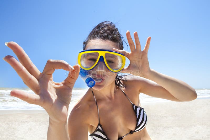 Diving girl in a swimming mask