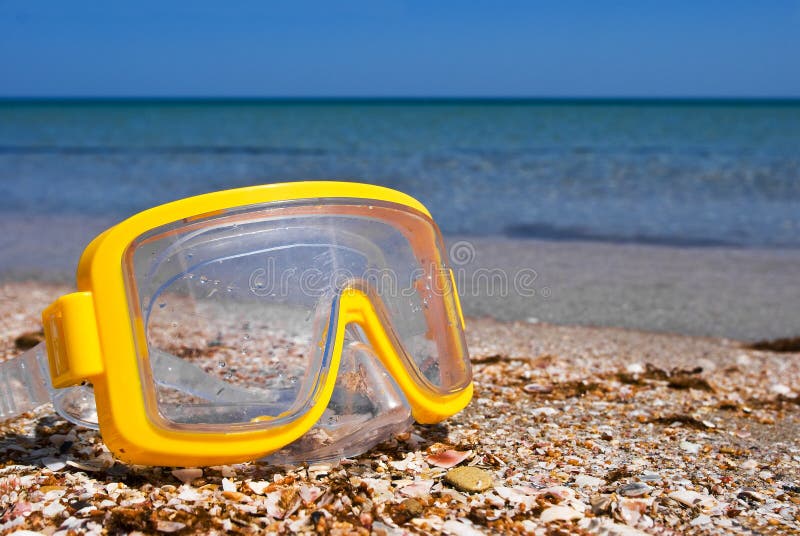 Diving mask on a sea coast stock image. Image of akvalangizm 20434483
