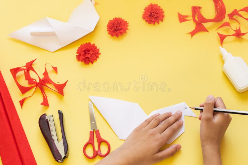 DIY instructions. How to make card with carnation flowers and origami dove at home. Card to Victory Day 9 May. Step by step photo. DIY instructions. Step by step royalty free stock photo DIY instructions. How to make card with carnation flowers and origami dove at home. Card to Victory Day 9 May. Step by step photo. DIY instructions. Step by step royalty free stock photo